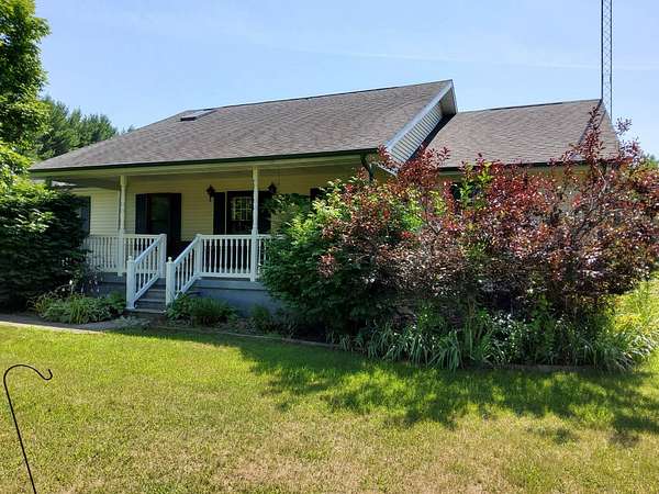 5 Acres of Residential Land with Home for Auction in Pierceton, Indiana