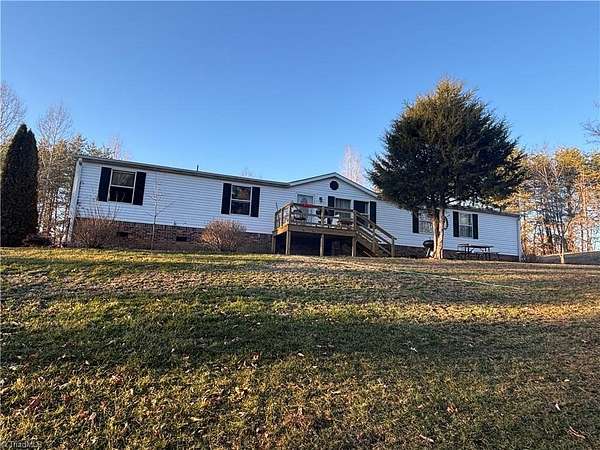 1.67 Acres of Residential Land with Home for Sale in Tobaccoville, North Carolina