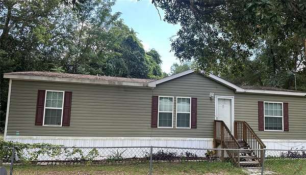 2.2 Acres of Residential Land with Home for Sale in Leesburg, Florida