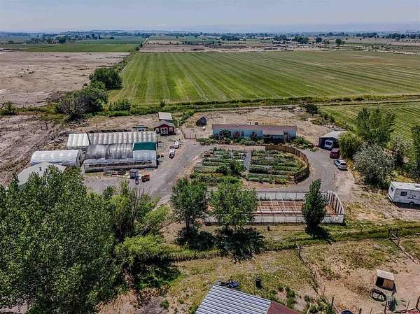 5 Acres of Land with Home for Sale in Olathe, Colorado