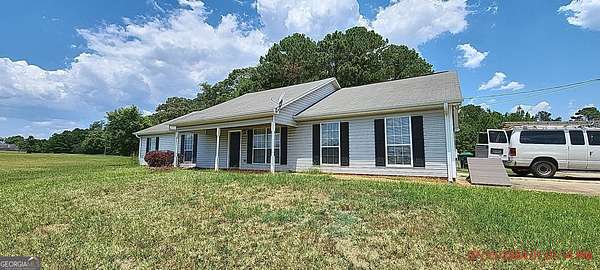 2.85 Acres of Residential Land with Home for Lease in McDonough, Georgia