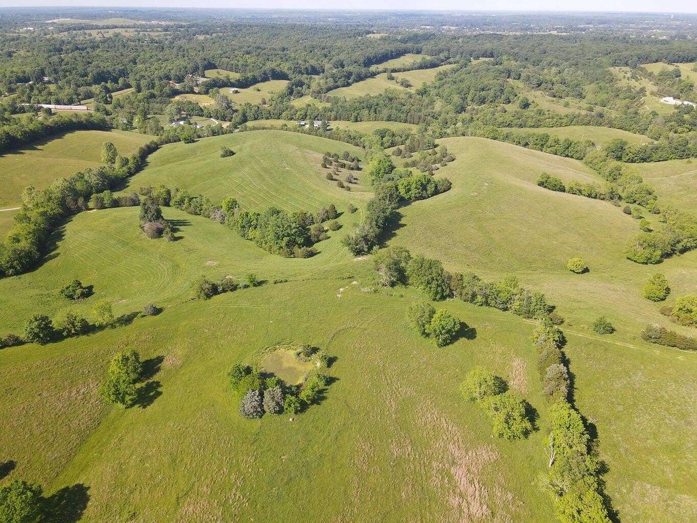 148 Acres of Land with Home for Sale in Lawrenceburg, Kentucky