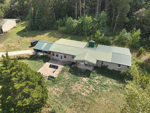 35.9 Acres of Land with Home for Sale in Linden, Tennessee