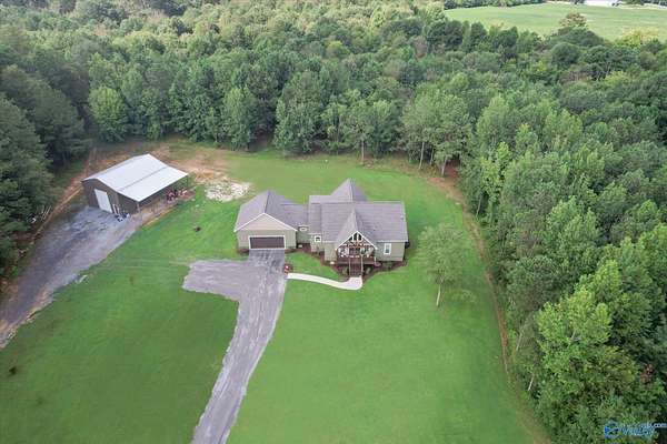 24.7 Acres of Recreational Land with Home for Sale in Joppa, Alabama