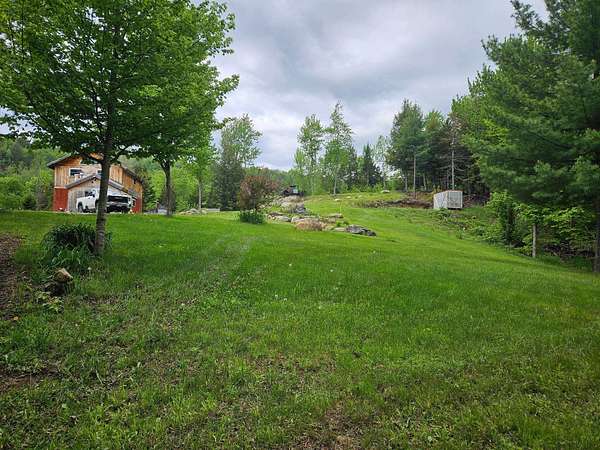 13.3 Acres of Recreational Land with Home for Sale in Lowell, Vermont
