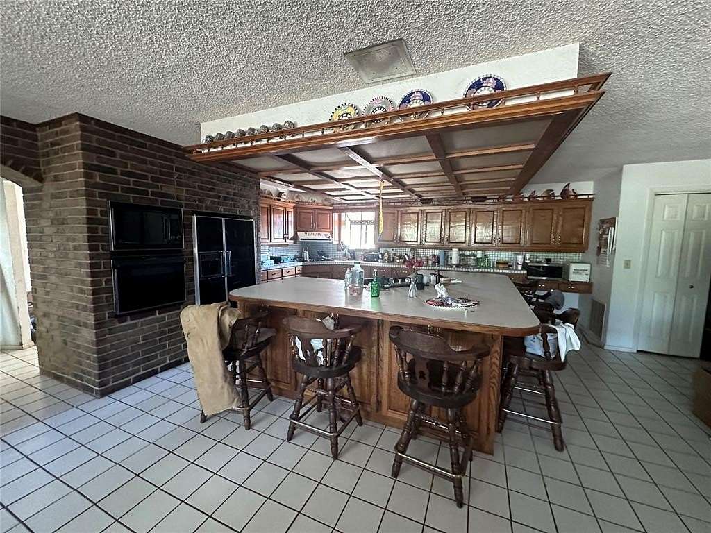 98 Acres of Agricultural Land with Home for Sale in Idabel, Oklahoma