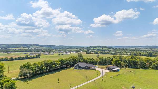 12.2 Acres of Land with Home for Sale in Cornersville, Tennessee