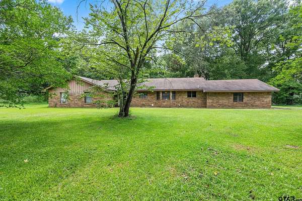 6.6 Acres of Residential Land with Home for Sale in Omaha, Texas