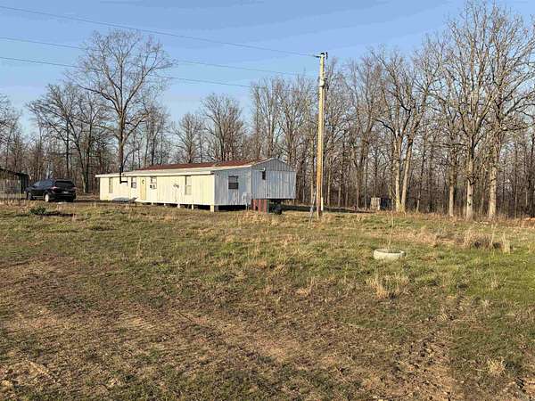15 Acres of Land with Home for Sale in Camp, Arkansas