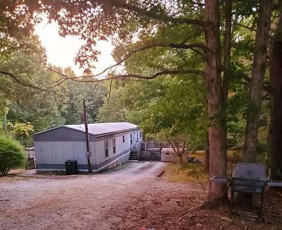 25.8 Acres of Recreational Land with Home for Sale in Huntingdon, Tennessee