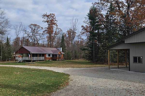 6.9 Acres of Residential Land with Home for Sale in Mountain, Wisconsin