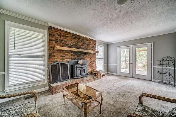 3.32 Acres of Residential Land with Home for Lease in Ball Ground, Georgia