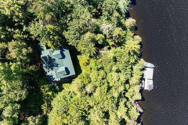 10.4 Acres of Land with Home for Sale in Eagle Bay, New York