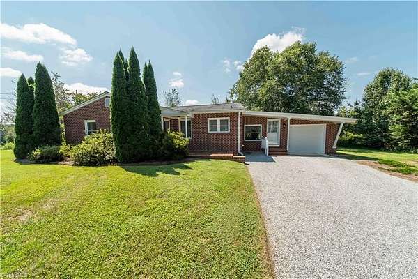 3.5 Acres of Residential Land with Home for Sale in Colfax, North Carolina