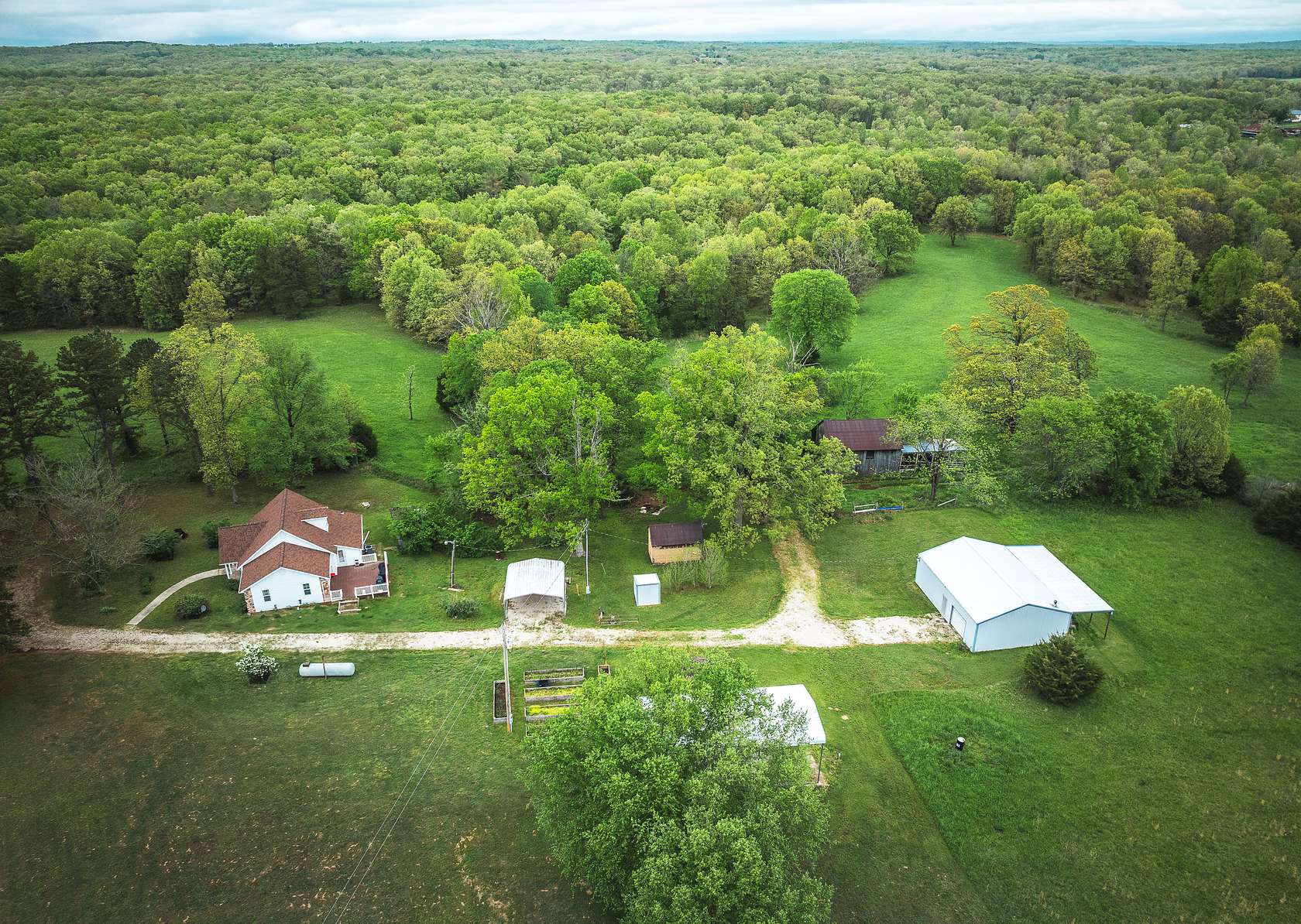 65 Acres of Land with Home for Sale in Leasburg, Missouri