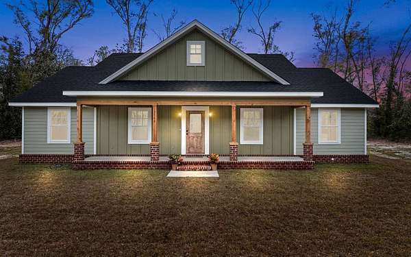 4.3 Acres of Residential Land with Home for Sale in Live Oak, Florida