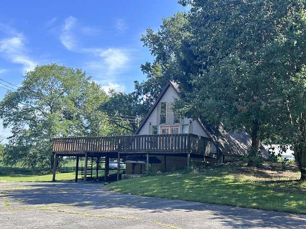 1.5 Acres of Residential Land with Home for Sale in Russell Springs, Kentucky