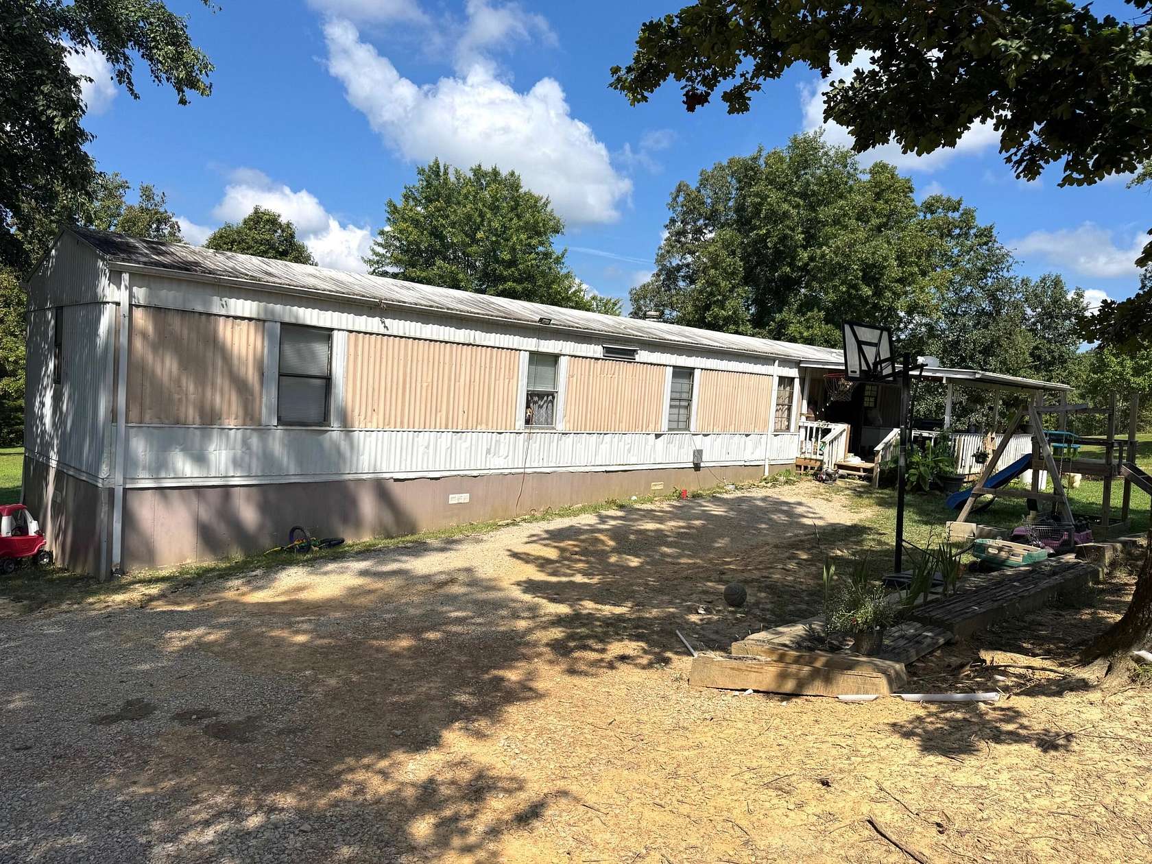 2 Acres of Residential Land with Home for Sale in Williamsburg, Kentucky