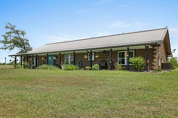 10 Acres of Residential Land with Home for Sale in New Waverly, Texas