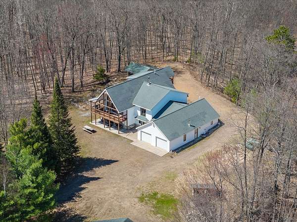 3 Acres of Residential Land with Home for Sale in Lake Tomahawk, Wisconsin