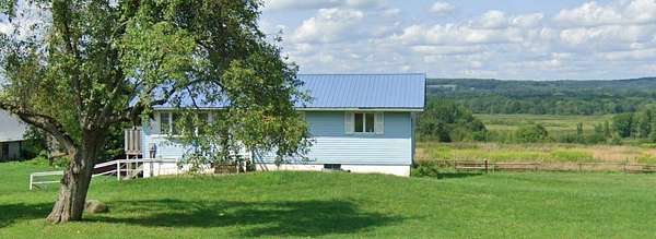 20 Acres of Land with Home for Sale in Conneaut Lake, Pennsylvania