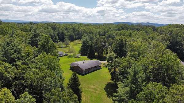 6.8 Acres of Residential Land with Home for Sale in Rock, West Virginia