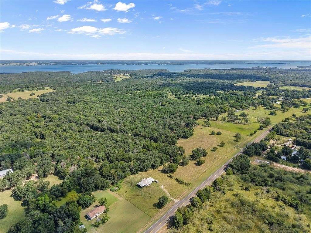 2 Acres of Residential Land with Home for Sale in Streetman, Texas