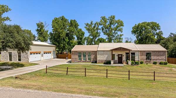 3.1 Acres of Land with Home for Sale in Granbury, Texas
