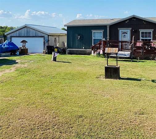 3 Acres of Residential Land with Home for Sale in Quinlan, Texas