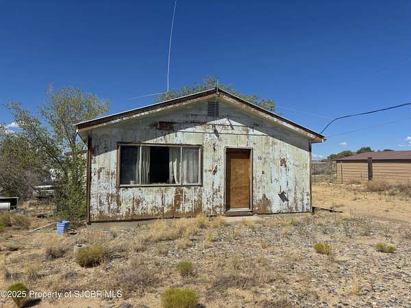 1.5 Acres of Residential Land with Home for Sale in Farmington, New Mexico
