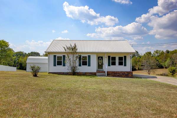 1.5 Acres of Residential Land with Home for Sale in Woodlawn, Tennessee