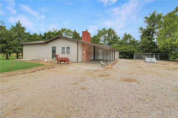 9.45 Acres of Residential Land with Home for Sale in Oswego, Kansas