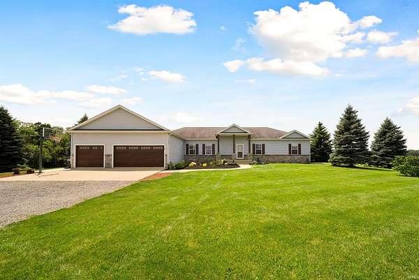 8.61 Acres of Land with Home for Sale in Larwill, Indiana