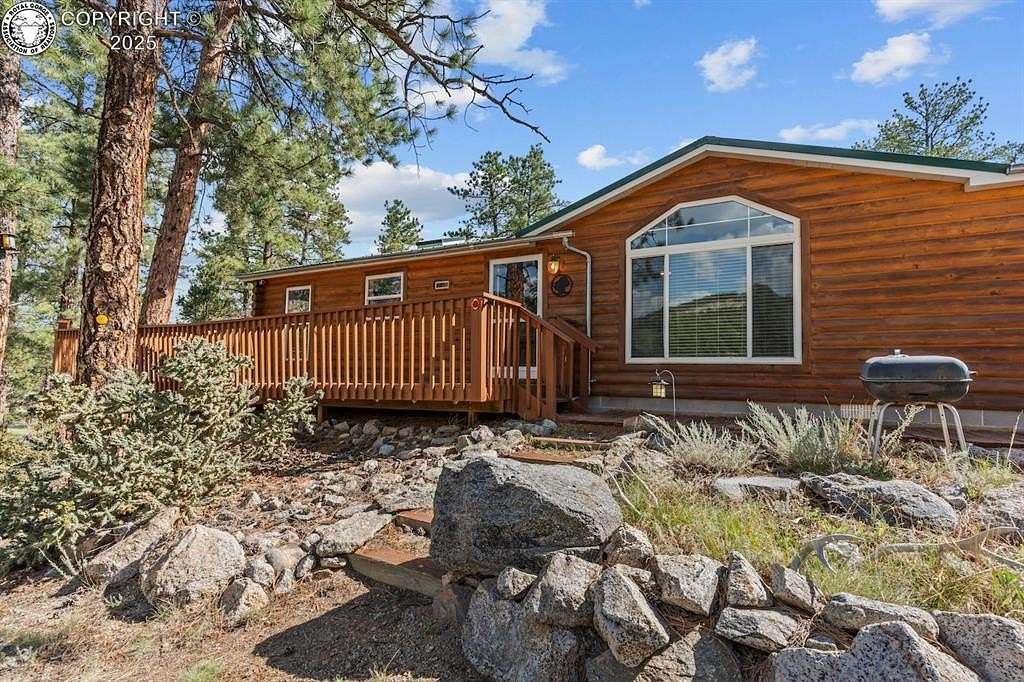 10.6 Acres of Land with Home for Sale in Texas Creek, Colorado