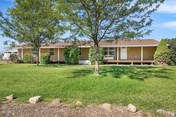 1.7 Acres of Residential Land with Home for Sale in Plain City, Utah