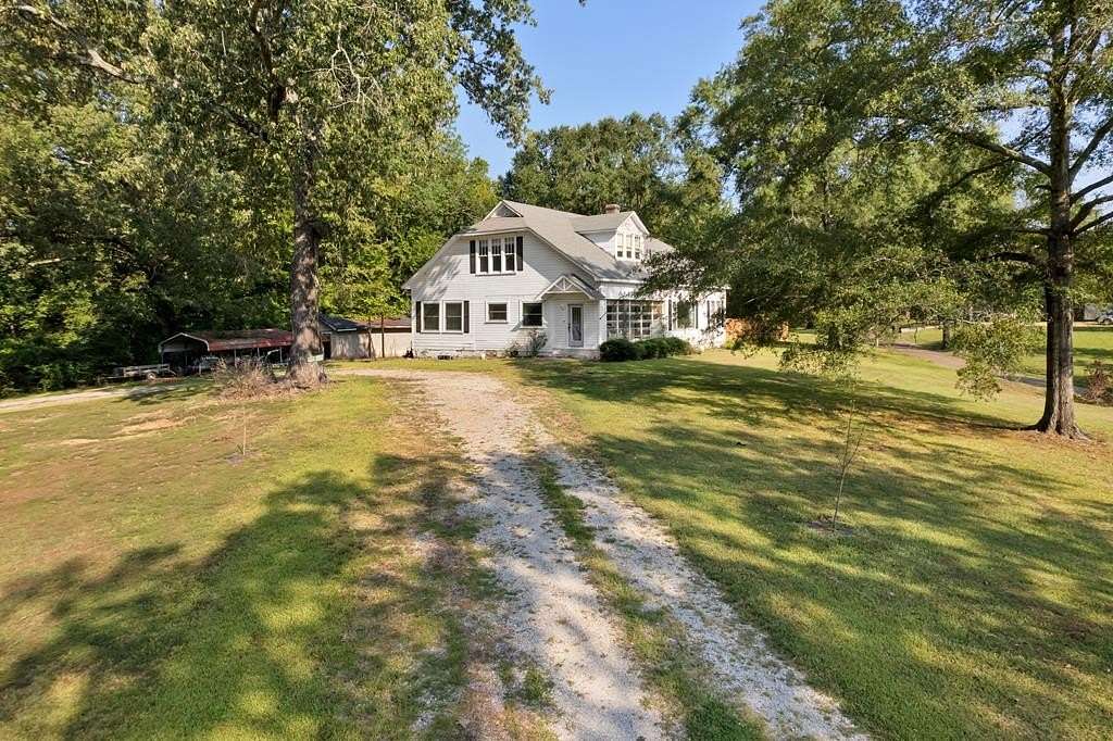 1.9 Acres of Residential Land with Home for Sale in Calhoun City, Mississippi