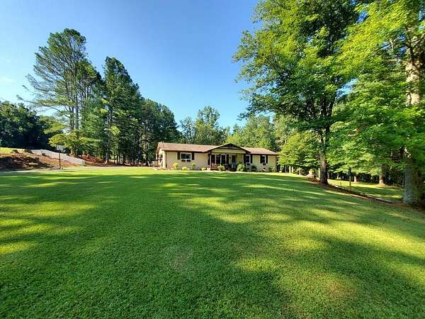 4.5 Acres of Residential Land with Home for Sale in Talking Rock, Georgia