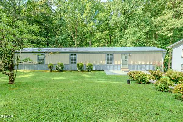 4.37 Acres of Land with Home for Sale in Sevierville, Tennessee
