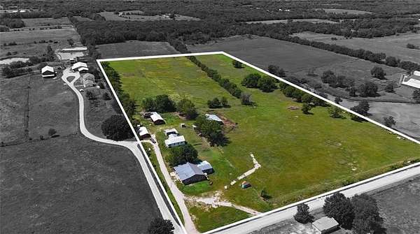 19.5 Acres of Land with Home for Auction in Fort Scott, Kansas