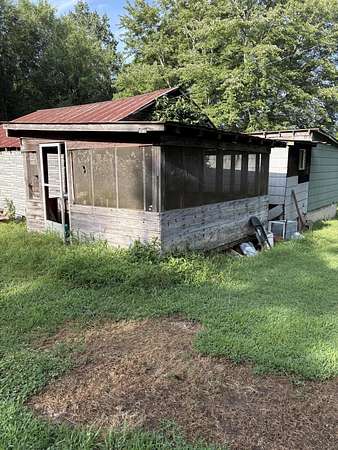 2.2 Acres of Residential Land with Home for Sale in Benton, Tennessee