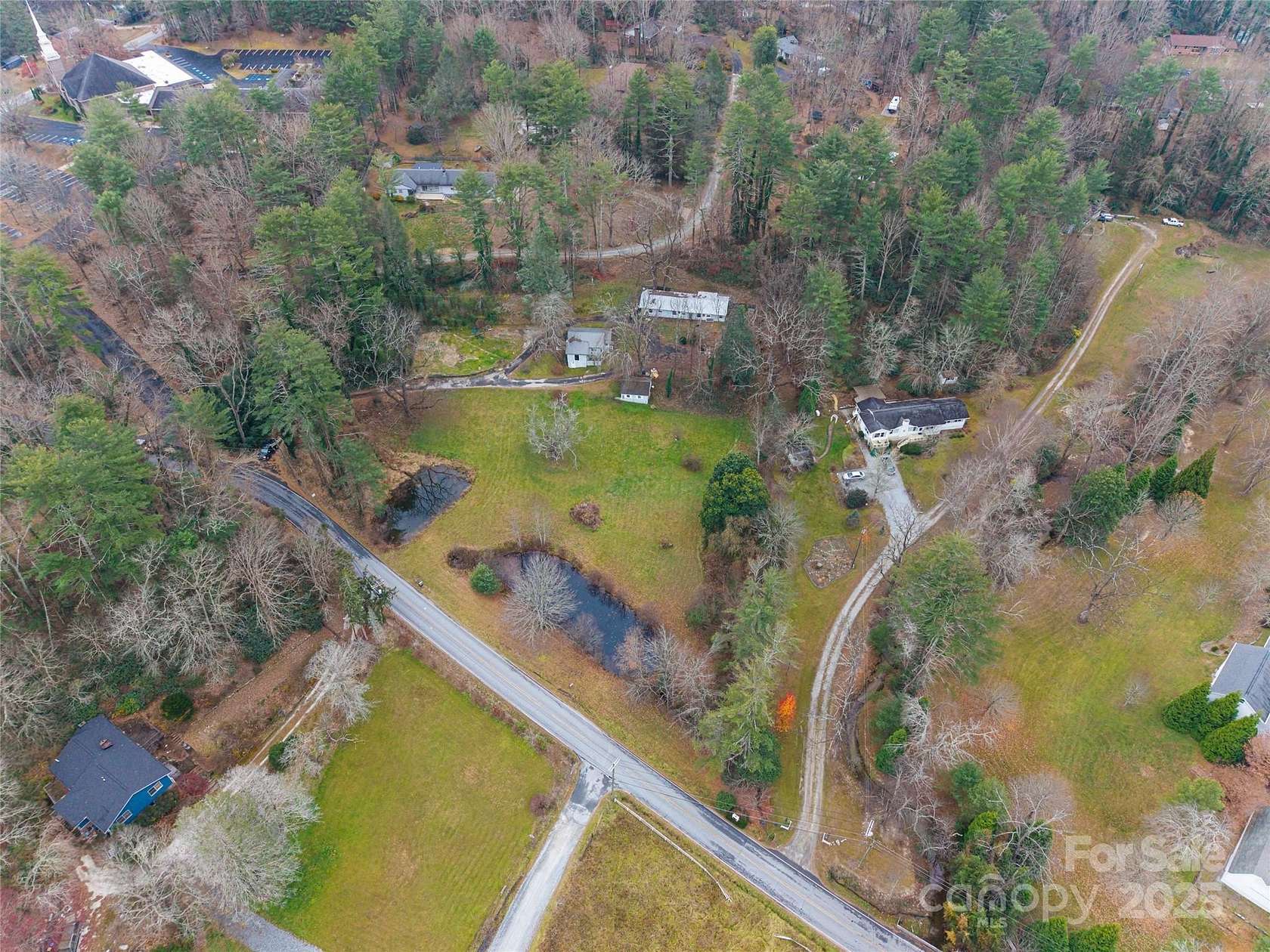 2.7 Acres of Residential Land with Home for Sale in Hendersonville, North Carolina