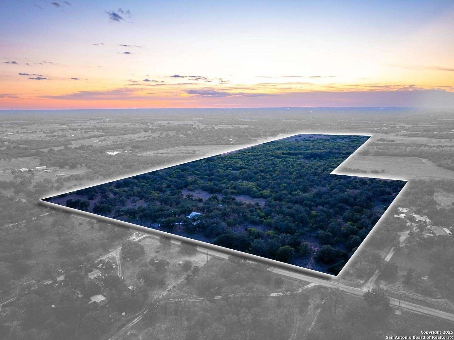 105 Acres of Agricultural Land with Home for Sale in Seguin, Texas