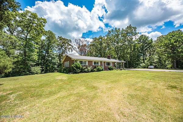 80 Acres of Land with Home for Sale in Lexington, Tennessee