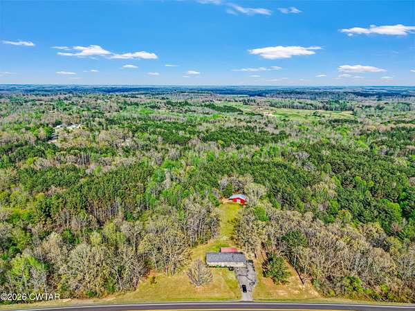 80 Acres of Recreational Land with Home for Sale in Lexington, Tennessee