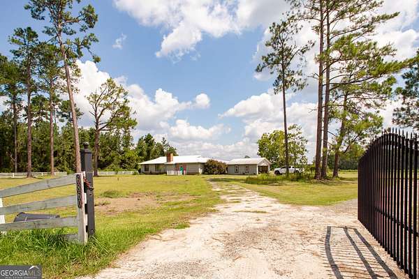 11.1 Acres of Land with Home for Sale in Millwood, Georgia