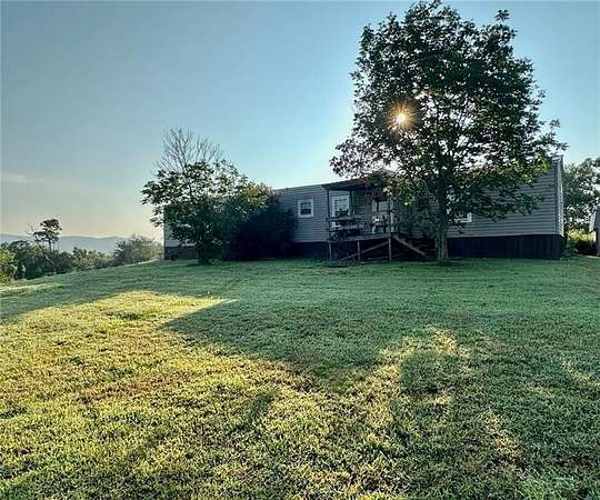 28 Acres of Agricultural Land with Home for Sale in Parks, Arkansas