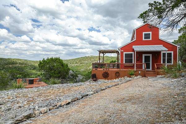 24.7 Acres of Recreational Land with Home for Sale in Mico, Texas