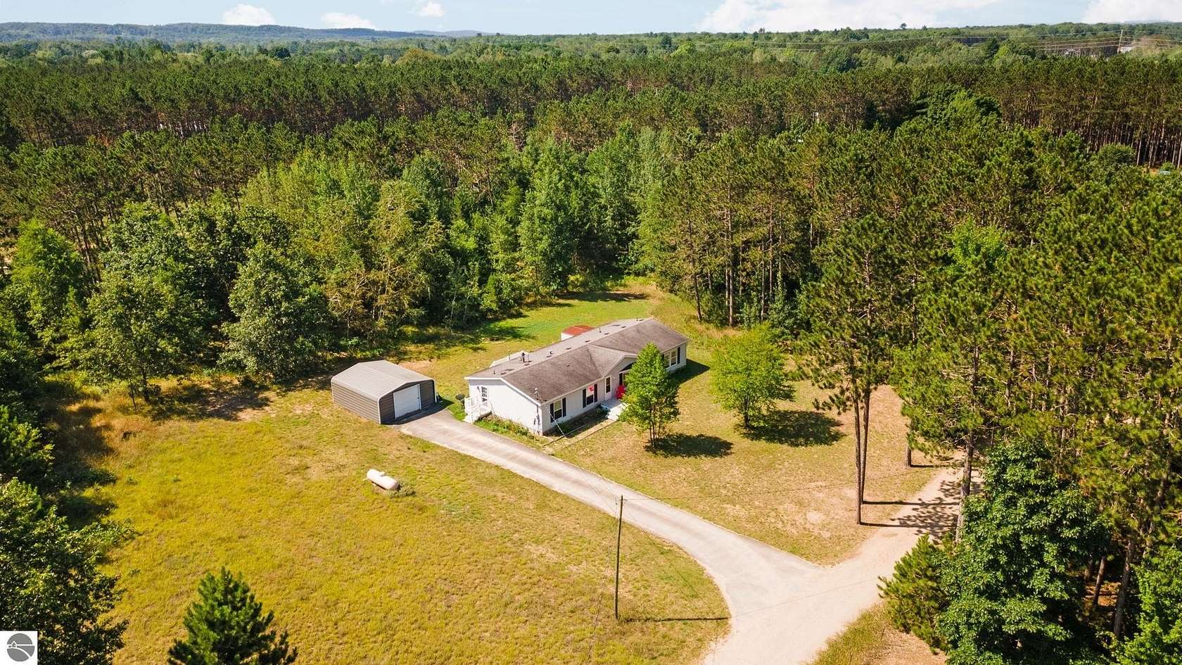 3 Acres of Residential Land with Home for Sale in Grawn, Michigan