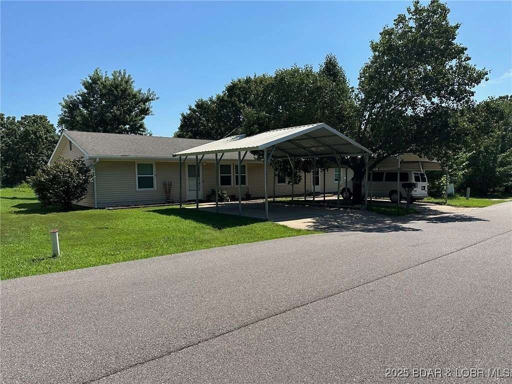 4.26 Acres of Residential Land with Home for Sale in Gravois Mills, Missouri