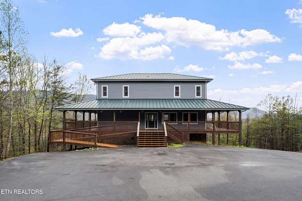 5 Acres of Residential Land with Home for Sale in Gatlinburg, Tennessee